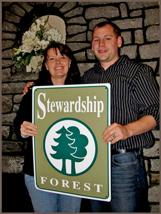 Missy and Cory Huskinson with King County Stewardship award